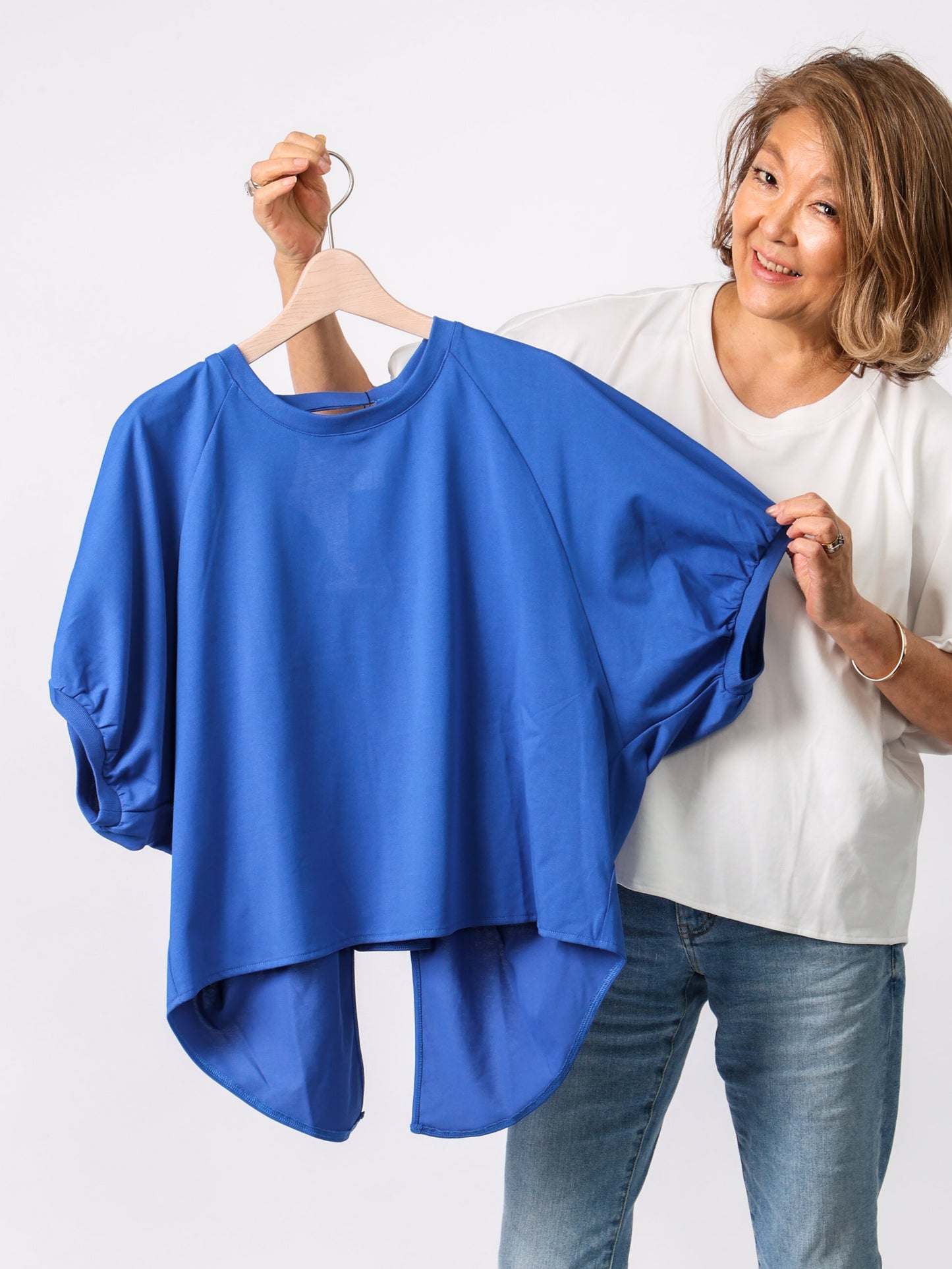 シャーリングバックリボントップス（BEATRICE）